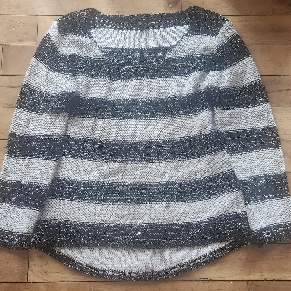 Sparkly black and silver sweater.